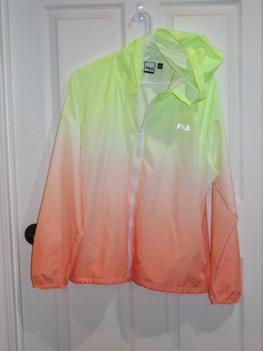 Women's FILA lime green and orange hooded windbreaker. New. XL.